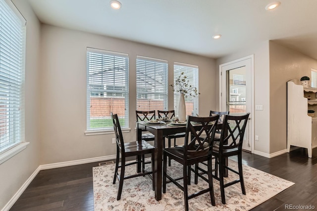 14067 Hudson St, Thornton, CO 80602 - dining room featuring baseboards, dark wood-type flooring, and recessed lighting