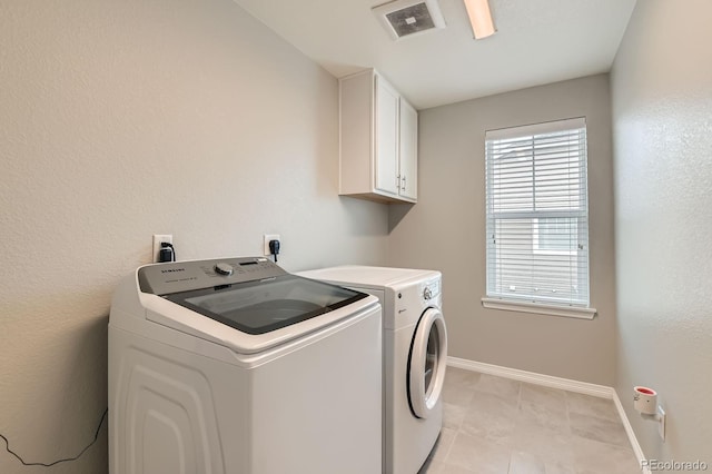 14067 Hudson St, Thornton, CO 80602 - washroom with cabinet space, washer and dryer, and baseboards