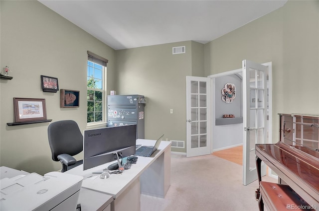 office area with light carpet and french doors