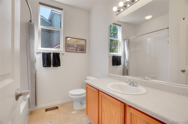 full bathroom featuring baseboards, visible vents, toilet, tile patterned floors, and vanity