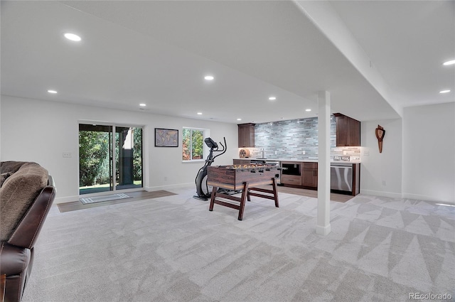 playroom featuring recessed lighting, light carpet, and baseboards