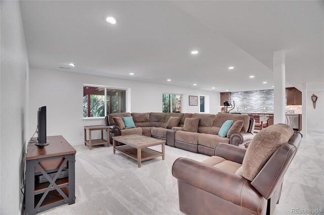 living room featuring light colored carpet