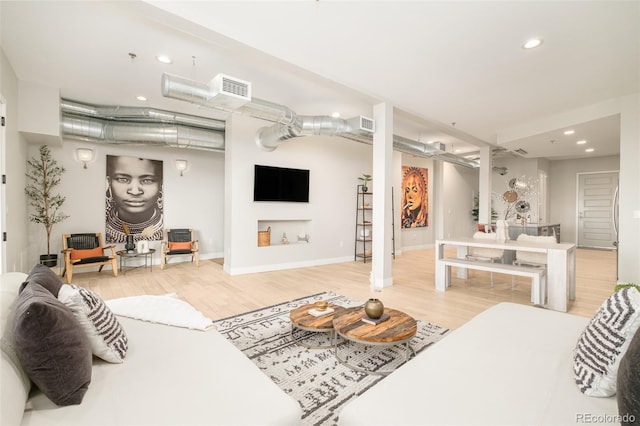 living room with wood-type flooring