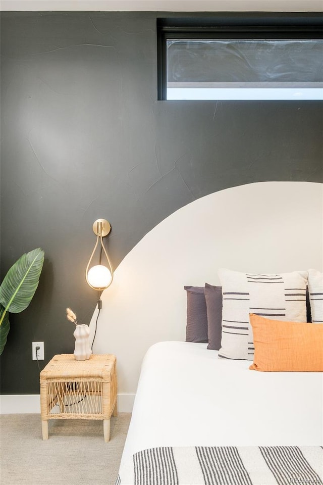 bedroom featuring vaulted ceiling and carpet floors