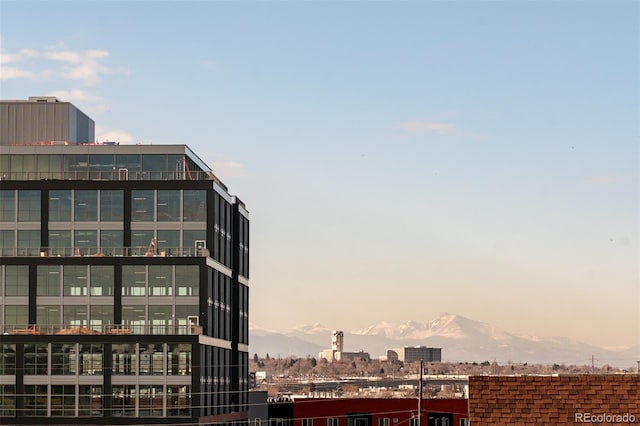 outdoor building at dusk featuring a mountain view