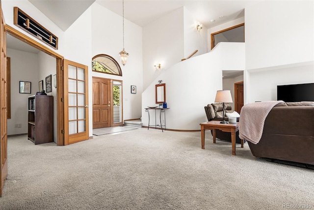 6252 King Dr, Evergreen, CO 80439 - carpeted foyer entrance with a high ceiling and baseboards
