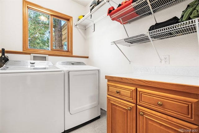 6252 King Dr, Evergreen, CO 80439 - washroom with washer and clothes dryer and light colored carpet