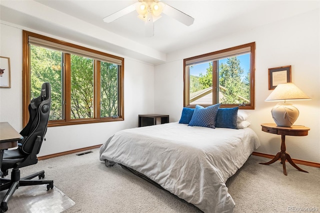 6252 King Dr, Evergreen, CO 80439 - carpeted bedroom with baseboards, a desk, and ceiling fan