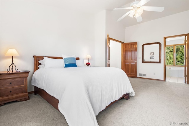 6252 King Dr, Evergreen, CO 80439 - bedroom featuring carpet flooring, baseboards, vaulted ceiling, connected bathroom, and ceiling fan