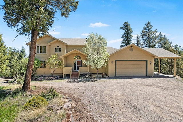 6252 King Dr, Evergreen, CO 80439 - view of front of property with dirt driveway, an attached garage, and roof with shingles