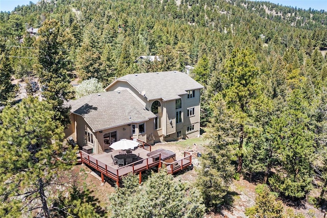 6252 King Dr, Evergreen, CO 80439 - aerial view of property and surrounding area with a heavily wooded area