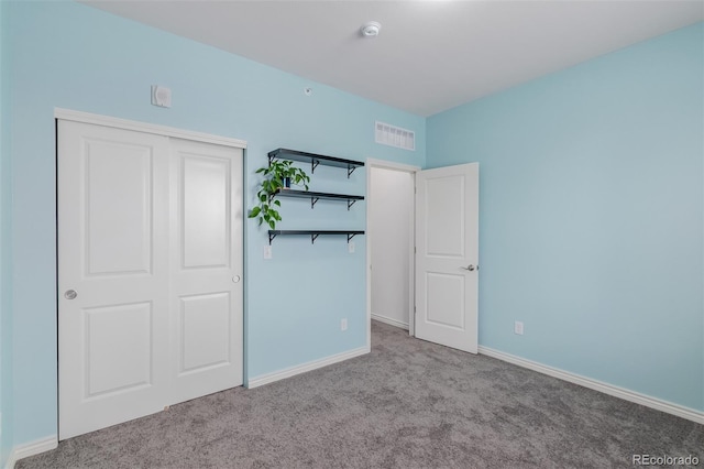332 N Parkside Dr Unit C, Longmont, CO 80501 - unfurnished bedroom featuring carpet and a closet