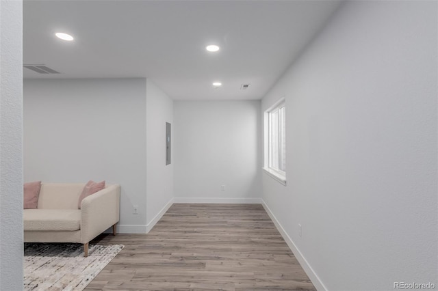 332 N Parkside Dr Unit C, Longmont, CO 80501 - living area with wood finished floors, electric panel, and recessed lighting