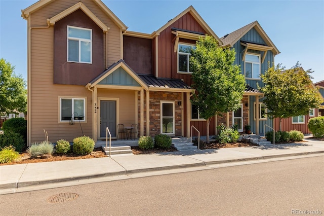 332 N Parkside Dr Unit C, Longmont, CO 80501 - multi unit property featuring board and batten siding, a standing seam roof, and a metal roof