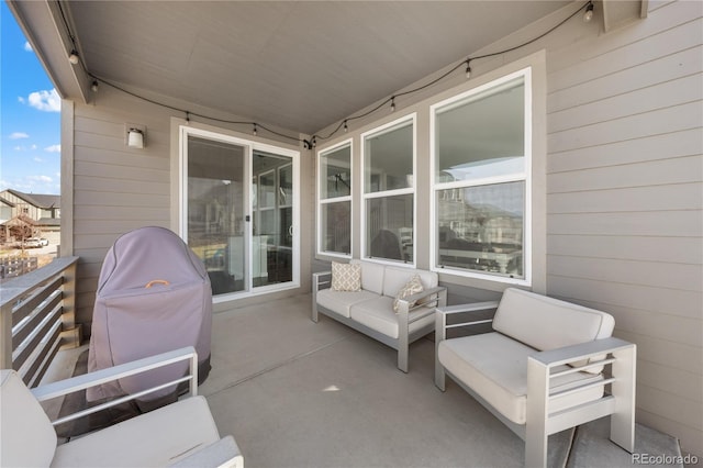 view of patio featuring an outdoor living space and a grill