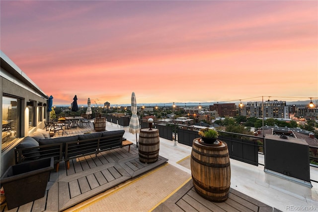 view of patio terrace at dusk