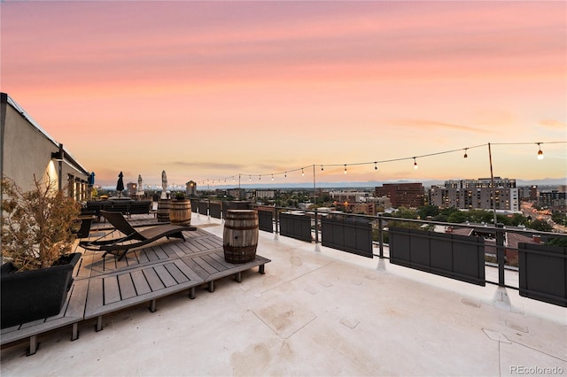 view of patio terrace at dusk