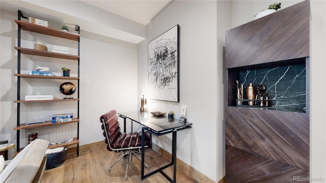 office space featuring light wood-type flooring