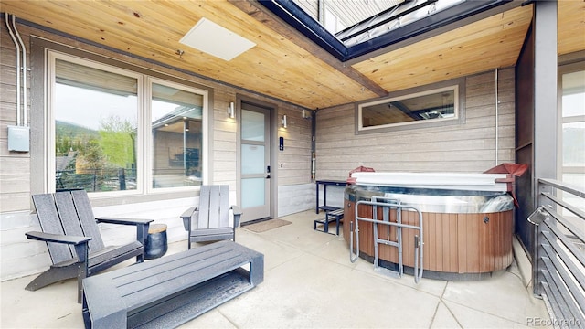 view of patio / terrace featuring a hot tub