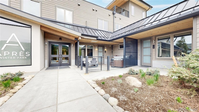 entrance to property featuring french doors