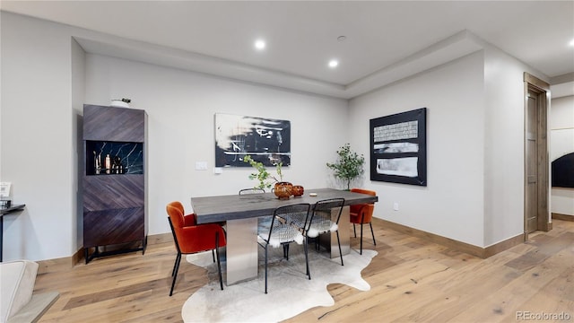 dining room featuring light hardwood / wood-style floors