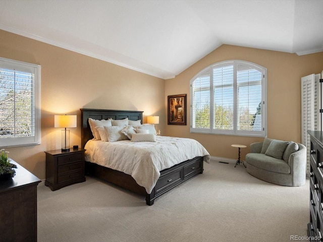 6266 W Prentice Ave, Littleton, CO 80123 - bedroom featuring vaulted ceiling, light colored carpet, crown molding, and baseboards