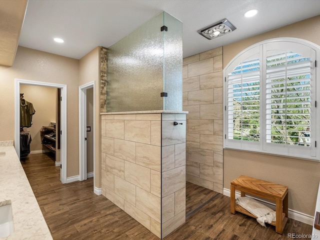 6266 W Prentice Ave, Littleton, CO 80123 - full bathroom with walk in shower, baseboards, and wood finished floors