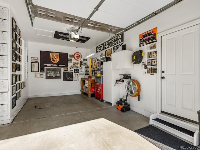 6266 W Prentice Ave, Littleton, CO 80123 - garage featuring a garage door opener