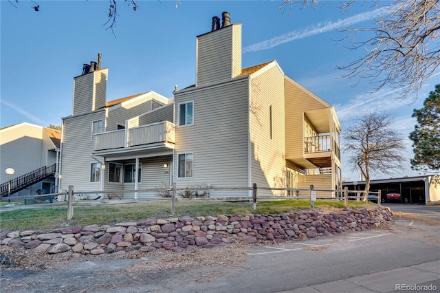 exterior space with a balcony