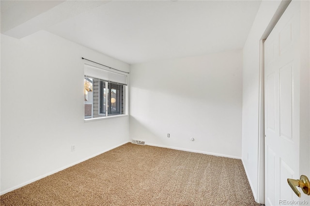 view of carpeted spare room