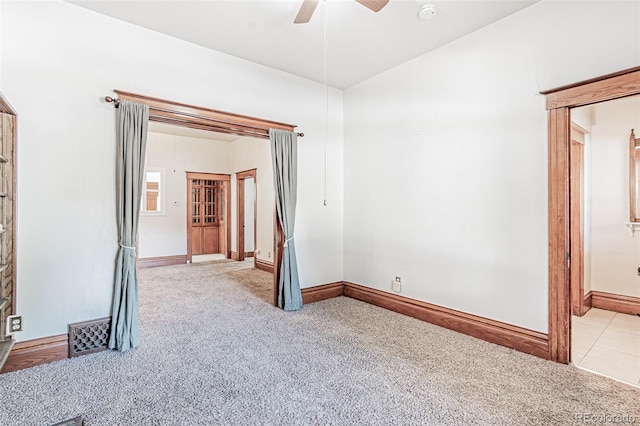 873 S Logan St, Denver, CO 80209 - carpeted spare room with a ceiling fan, a smoke detector, and lofted ceiling