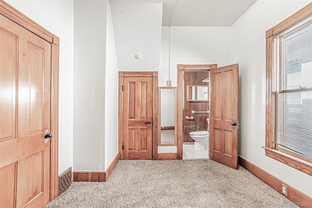 873 S Logan St, Denver, CO 80209 - unfurnished bedroom featuring carpet flooring and connected bathroom