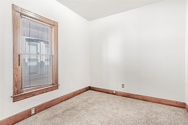 873 S Logan St, Denver, CO 80209 - spare room featuring carpet flooring and baseboards