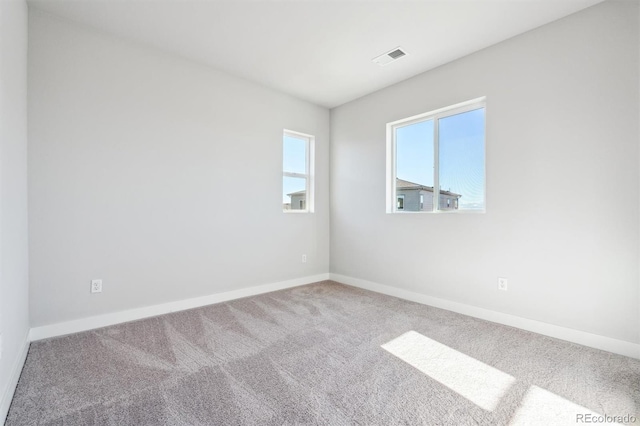 empty room featuring carpet