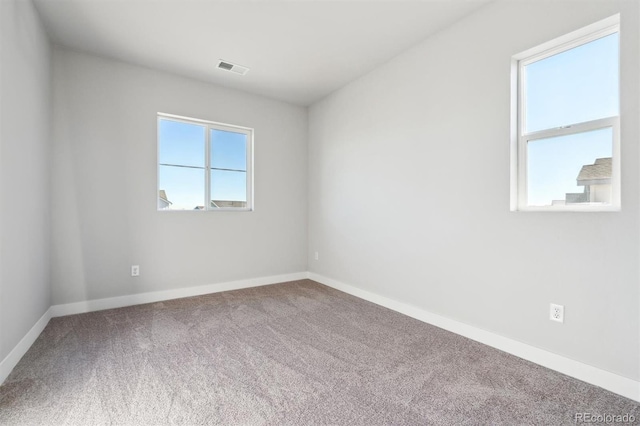 unfurnished room with carpet