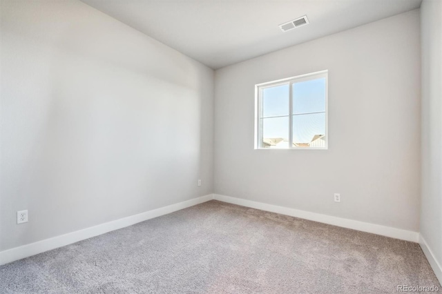 view of carpeted spare room