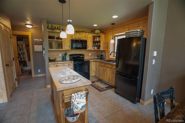25879 County Road 162e, Nathrop, CO 81236 - kitchen with black appliances, a sink, open shelves, wooden counters, and light tile patterned flooring