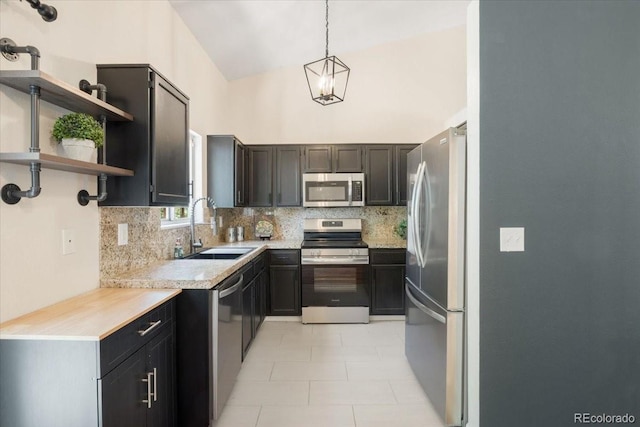 6318 Newton Ct, Arvada, CO 80003 - kitchen with stainless steel appliances, backsplash, light countertops, a high ceiling, and open shelves