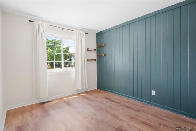 6318 Newton Ct, Arvada, CO 80003 - unfurnished room featuring wood finished floors