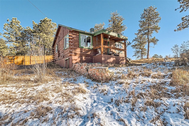 log home featuring log exterior