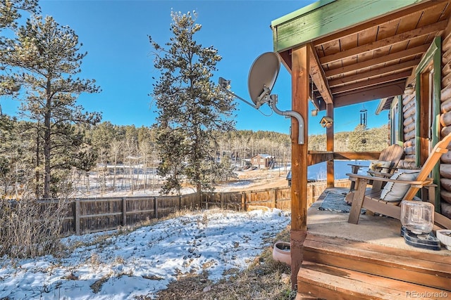 34502 Chilton Ave, Pine, CO 80470 - yard layered in snow with a fenced backyard