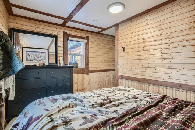 34502 Chilton Ave, Pine, CO 80470 - bedroom featuring wood walls