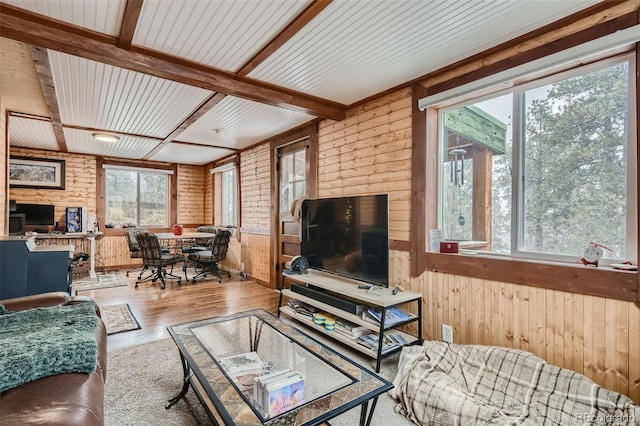 34502 Chilton Ave, Pine, CO 80470 - living room with wood walls, wood finished floors, and beam ceiling