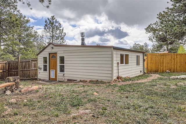 34502 Chilton Ave, Pine, CO 80470 - back of house featuring a fenced backyard