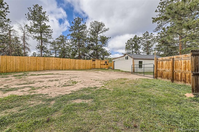 34502 Chilton Ave, Pine, CO 80470 - view of yard featuring a gate and a fenced backyard