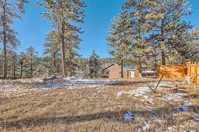 34502 Chilton Ave, Pine, CO 80470 - snowy yard with fence