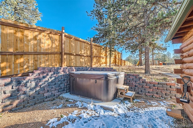 34502 Chilton Ave, Pine, CO 80470 - view of patio with a hot tub and fence