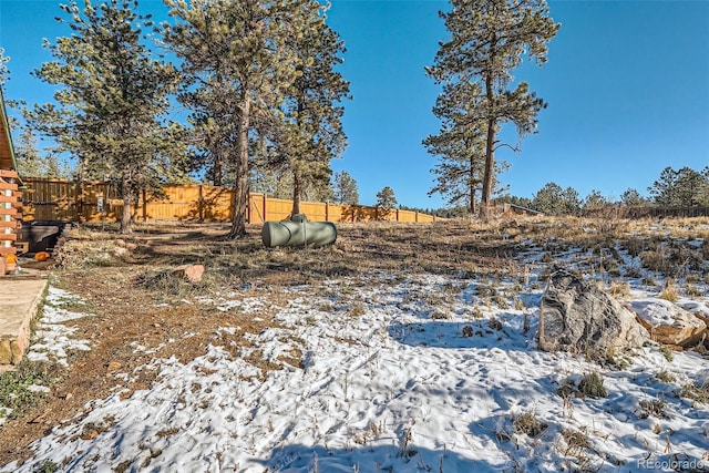 34502 Chilton Ave, Pine, CO 80470 - yard layered in snow with fence
