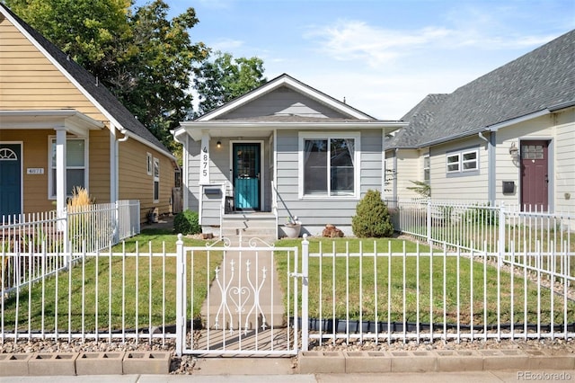 bungalow with a front yard