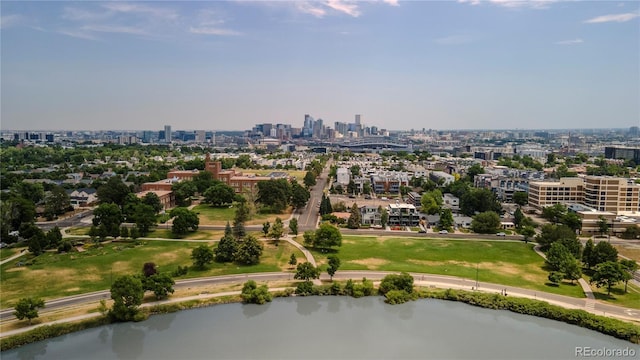 birds eye view of property featuring a water view